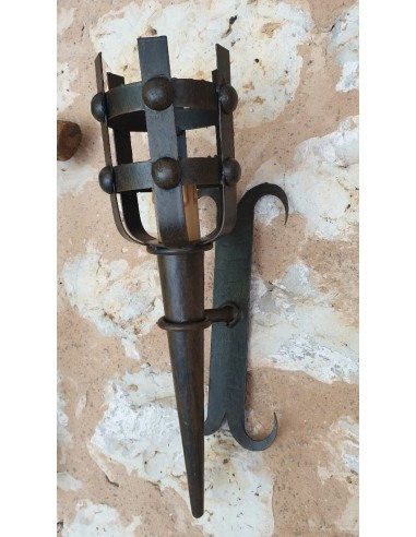 In our medieval shop you can buy handmade medieval style wrought iron wall lights and lamps